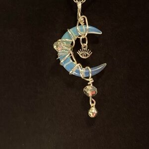 Handmade wire wrapped genuine Opilate stone pendant and chain.